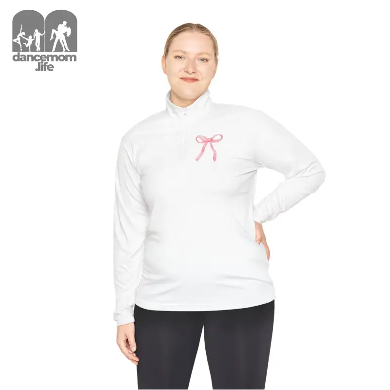 White long-sleeve athletic top with a pink bow design on the chest.