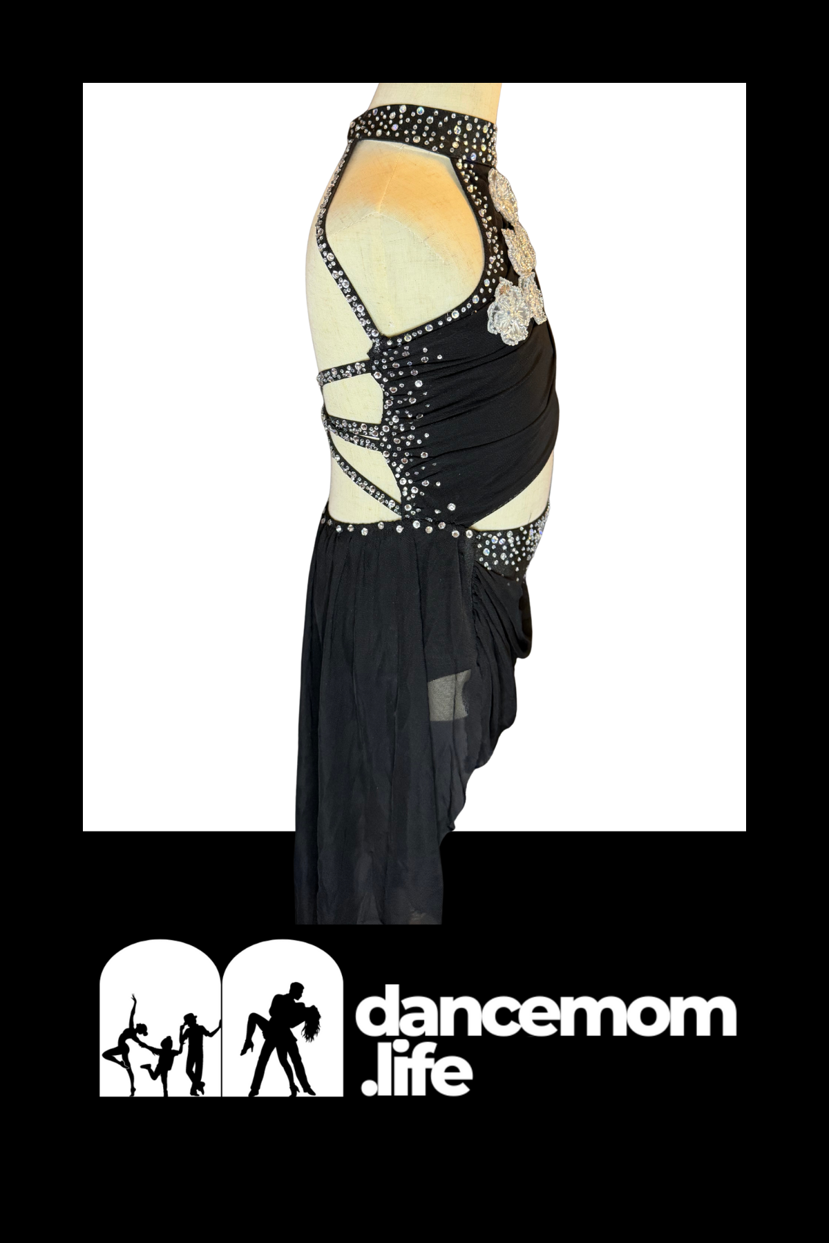 Black dance dress with sparkling silver rhinestone embellishments along the back straps and a sheer overlay.
