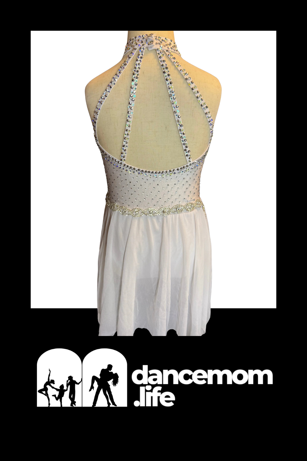 White dance dress with a halter neckline and back straps adorned with sparkling rhinestones, featuring an embellished waistband.