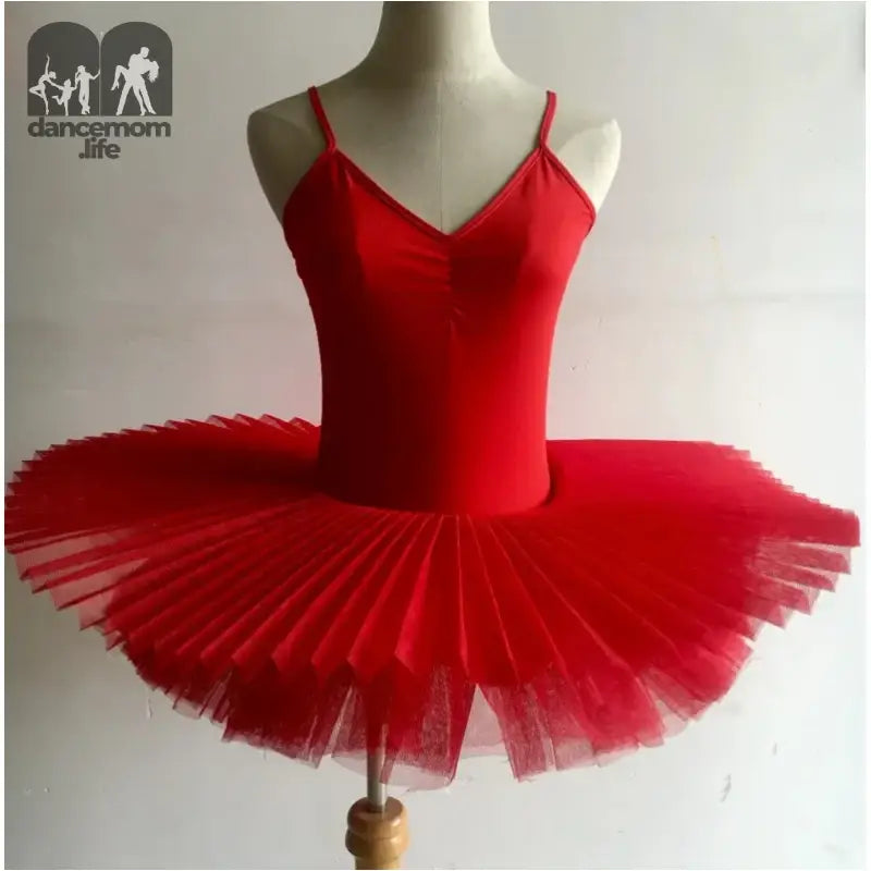 Bright red ballet tutu with a fitted bodice and pleated tulle skirt.