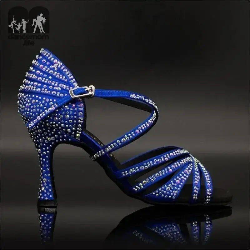 Blue rhinestone-studded dance shoe.