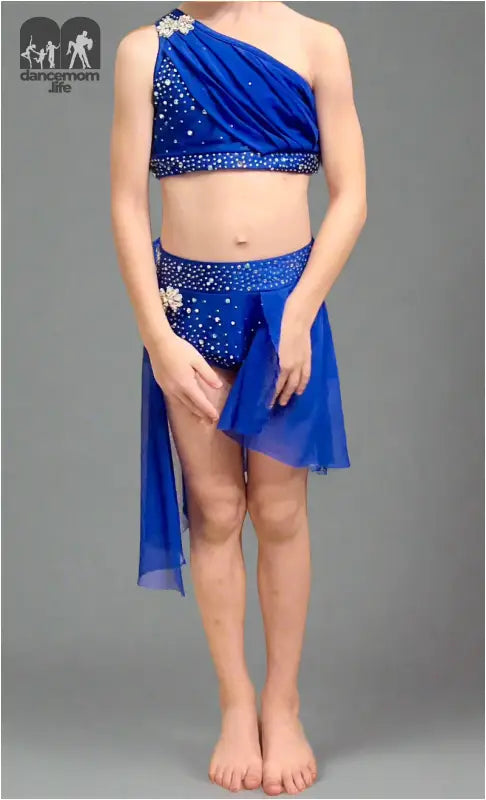 Sparkly blue two-piece dance costume with an asymmetrical skirt.