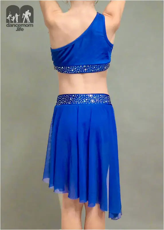 Blue two-piece dance costume with a sparkly waistband and asymmetrical skirt.