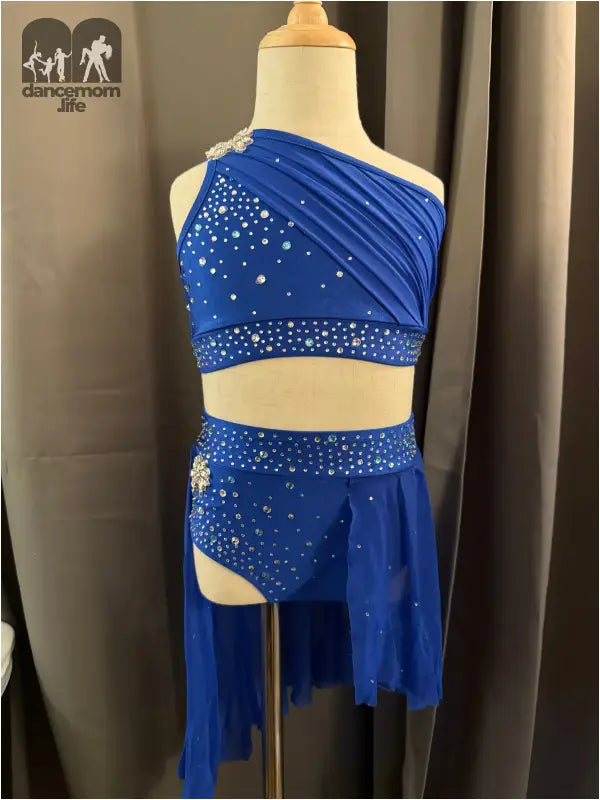 Blue, jeweled dance costume.