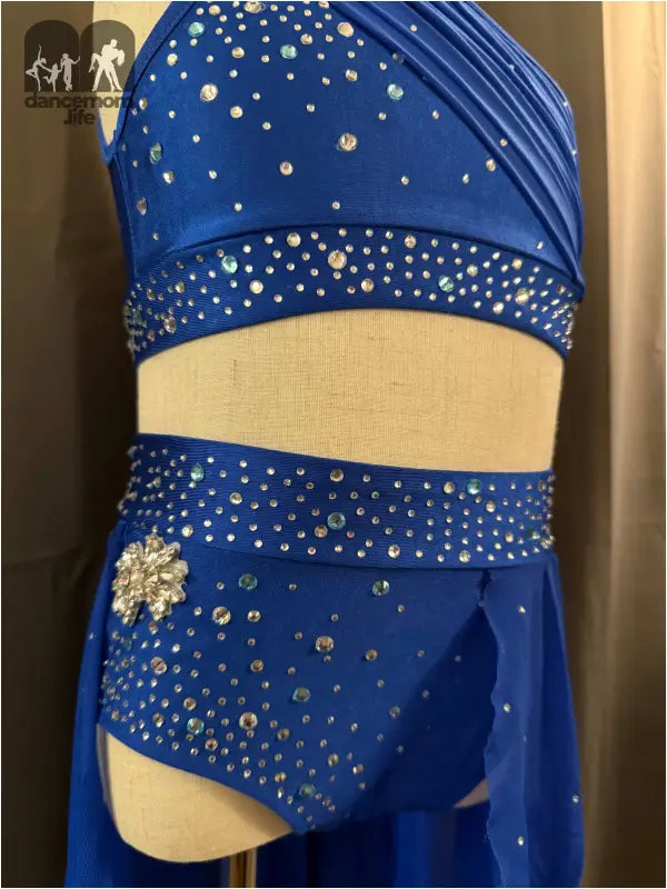 Blue, jeweled dance costume.