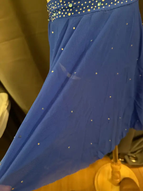 Blue sequined dance dress.