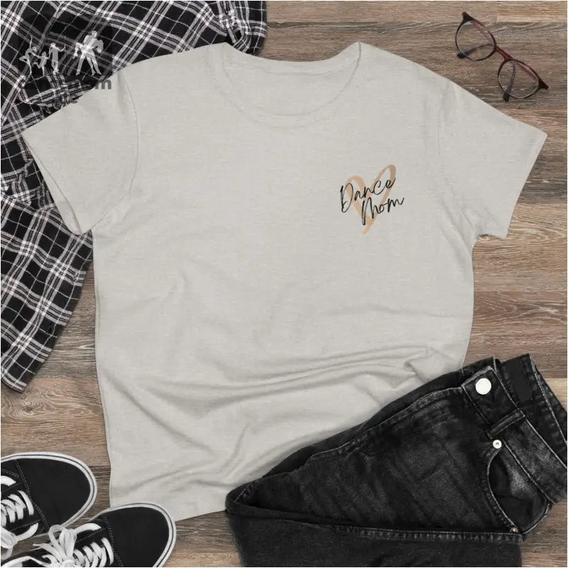 White t-shirt with small gold text detail on the chest.