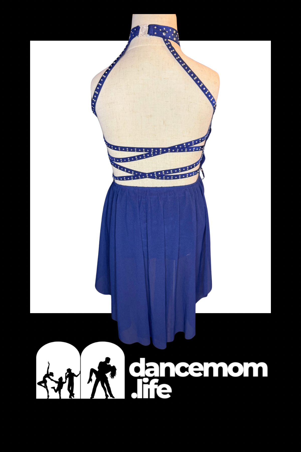 Blue dance leotard with a halter neckline and crisscross back straps adorned with white polka dots.