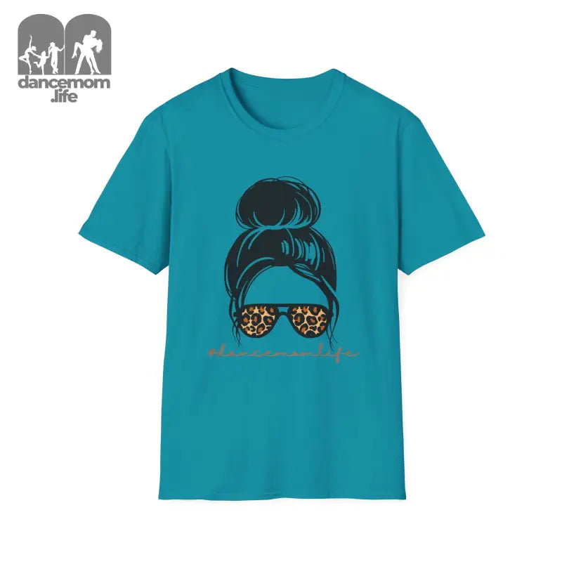 Teal t-shirt featuring a graphic design of a messy bun hairstyle and leopard print sunglasses.