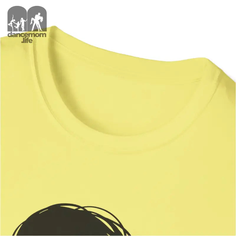 Yellow t-shirt with partial black graphic design visible at the bottom.