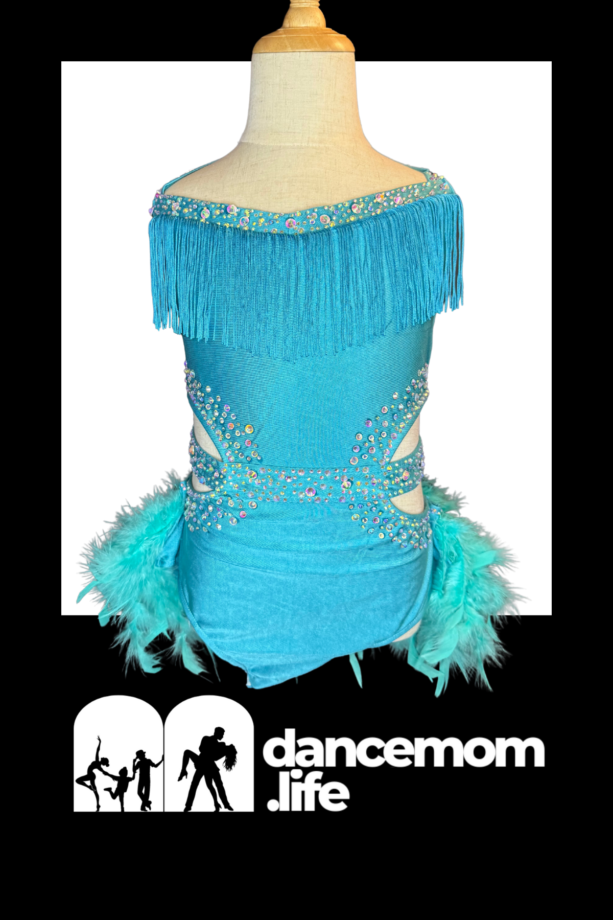 A vibrant turquoise dance dress with fringe detailing and feather trim, adorned with sparkling rhinestones along the neckline and waist.