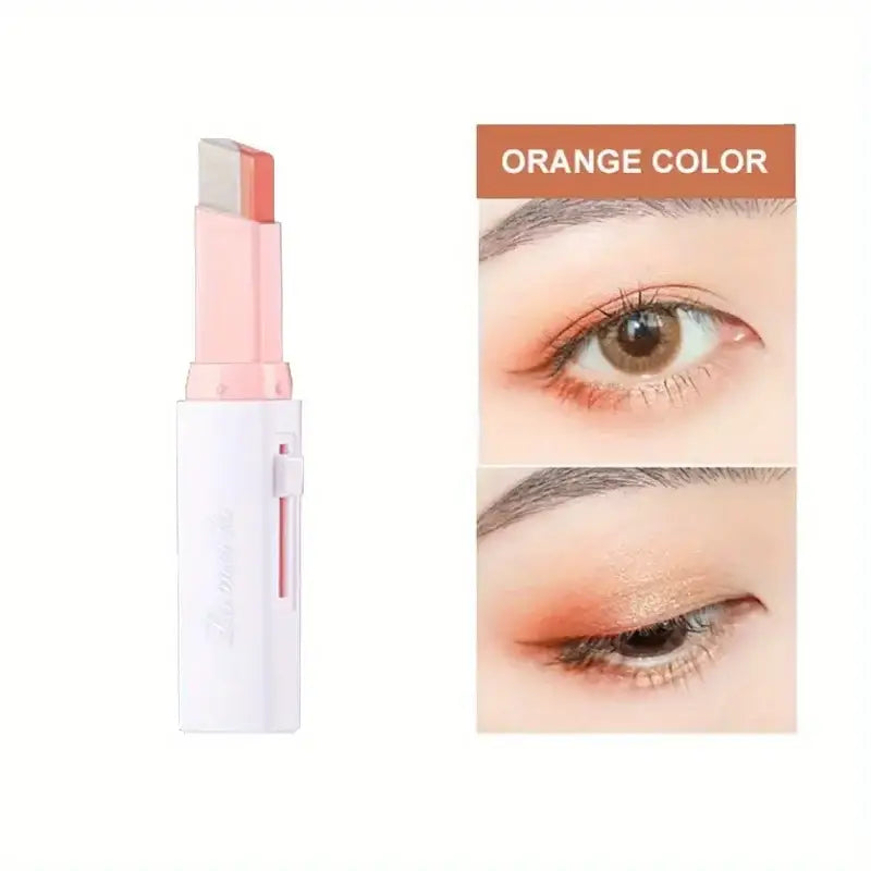 Two-tone eyeshadow stick with orange color swatches.