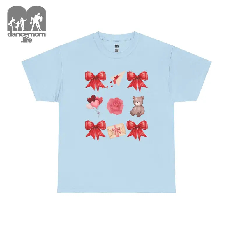 Light blue t-shirt with red bows, flowers, and teddy bear graphics arranged in a grid pattern.