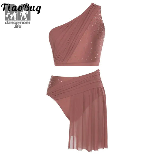 Dusty rose two-piece dance costume with a one-shoulder crop top and asymmetrical skirt featuring rhinestone details.