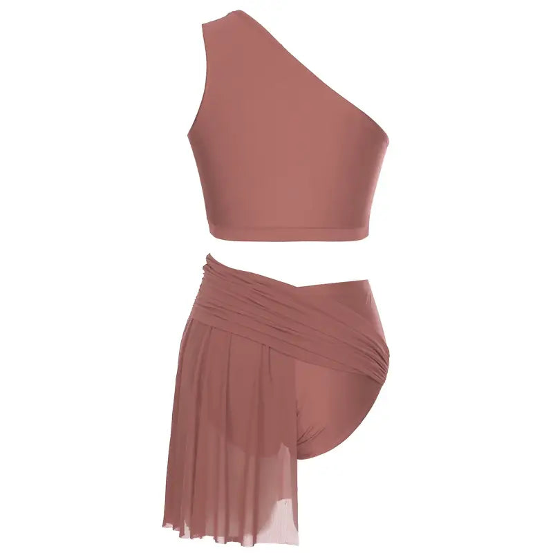 Dusty rose two-piece dance outfit with a one-shoulder crop top and asymmetrical draped skirt.