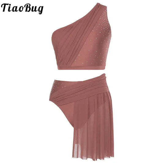 Dusty rose two-piece dance costume with a one-shoulder crop top and asymmetrical skirt featuring rhinestone details.