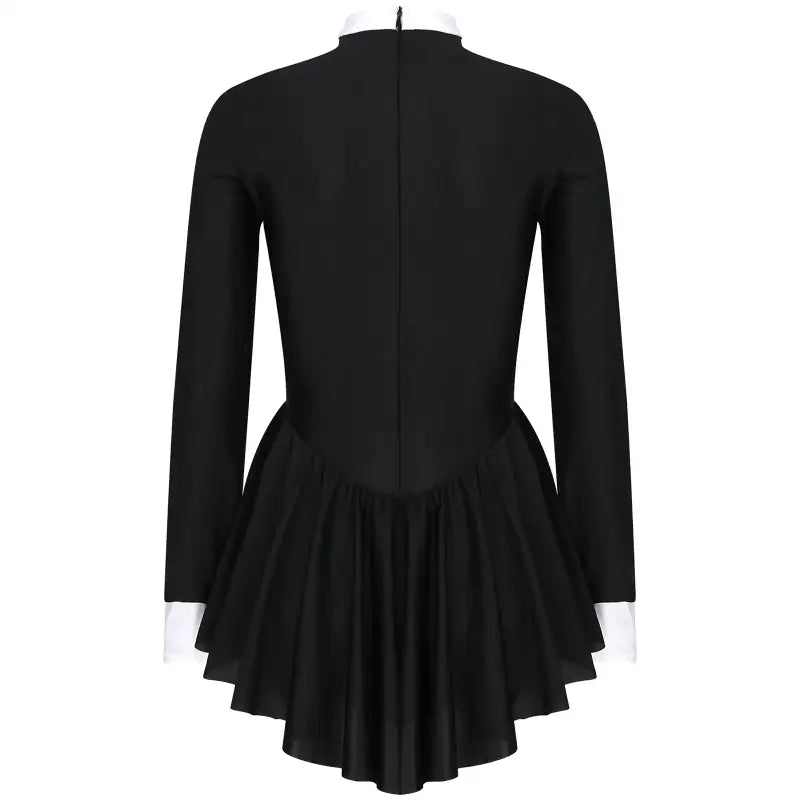 Black long-sleeved dress with a flared skirt and white cuffs.