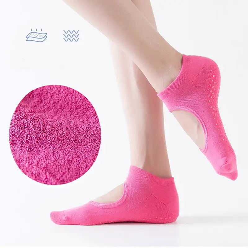 Pink yoga socks with grip.